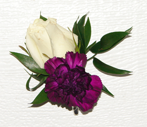 Purple and white corsage