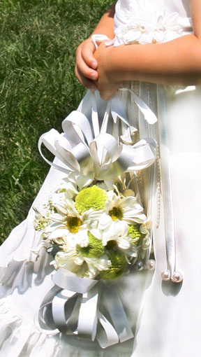 White Kissing Ball carried by the Flower Girl