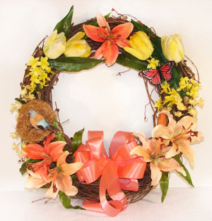 Door wreath with artificial flowers